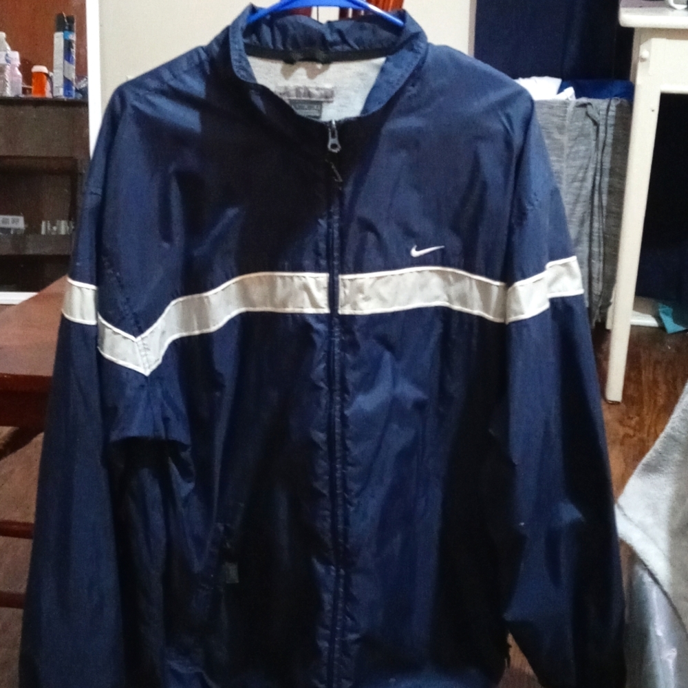 Vintage Nike windbreaker perfect condition.No Stains I mean none.Beautiful blue